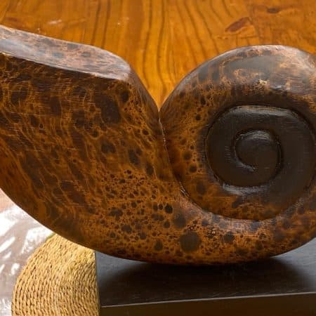 Decorative hand carved wooden shell on stand